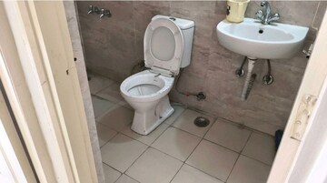 Bathroom in 2 BHK Apartment at Wave Dream Homes, Wave City – for Rent