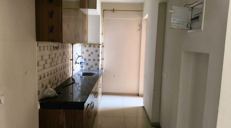 Kitchen, wave-dream-homes 2 Bedroom 808 Sq.Ft. Apartment In Wave City Ghaziabad 10064350