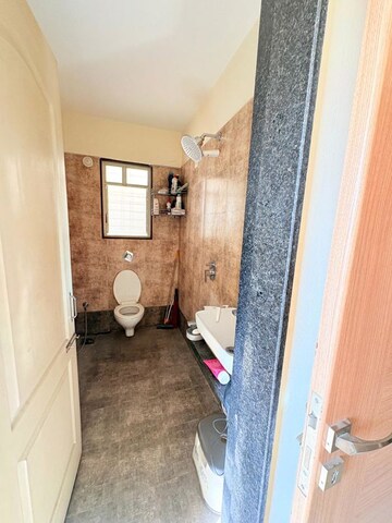 Bathroom in 2 BHK Apartment at LS Laxmi Avenue, Wakad – for Rent