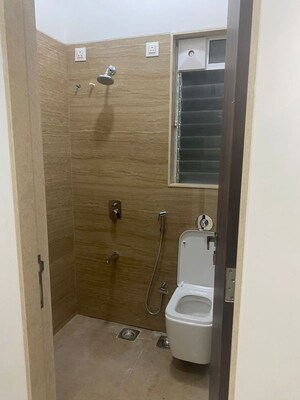 Bathroom in 3 BHK Apartment at Our Home CHS, Andheri West – for Rent