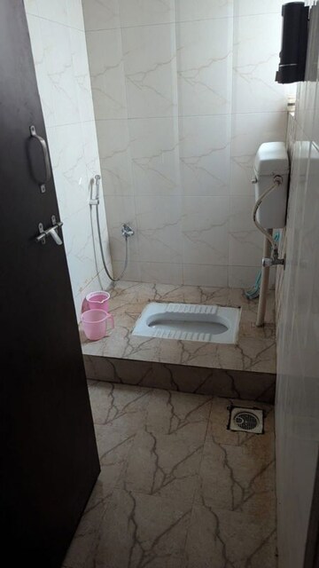 Bathroom in 2 BHK Apartment at Karan Ceto, Wadgaon Sheri – for Rent