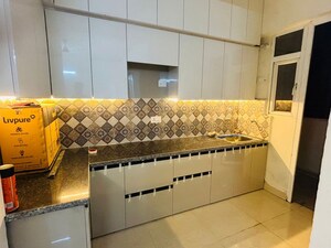 Kitchen in 2 BHK Apartment at Signature The Millennia 3, Sector 37d – for Rent