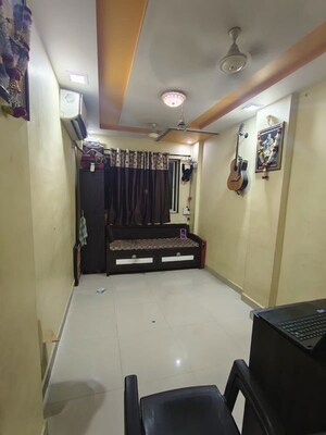 Master Bedroom in 1 BHK Apartment at Kailas Jyoti Chs, Dombivli West – for Sale