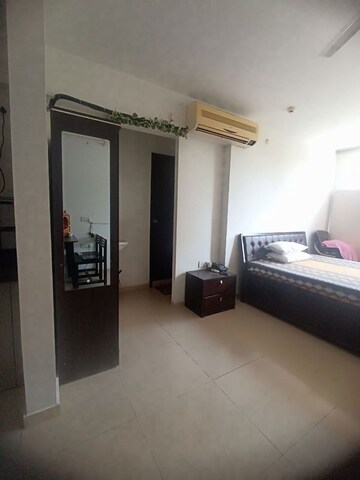 Bedroom in Studio Apartment at Amanora Future Towers, Hadapsar – for Rent