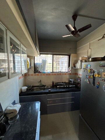 Kitchen in 2 BHK Apartment at Balbhim Park, Warje – for Rent
