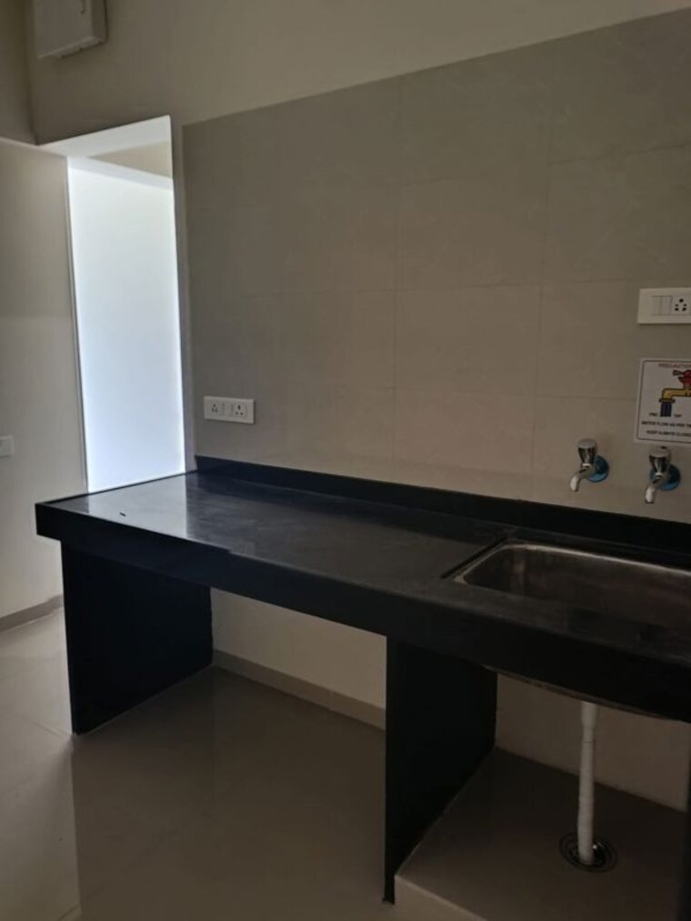 Kitchen, nyati-elysia 1 RK 400 Sq.Ft. Apartment In Kharadi Pune 10065172