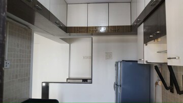 Kitchen in 2 BHK Apartment at Solitaire Heights, Malad West – for Rent