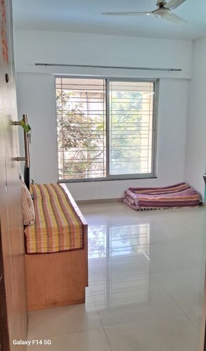Bedroom in 1 BHK Apartment at Karan Rhea, Wadegaon – for Rent