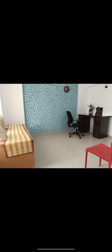 Bedroom in 1 BHK Apartment at Karan Rhea, Wadegaon – for Rent