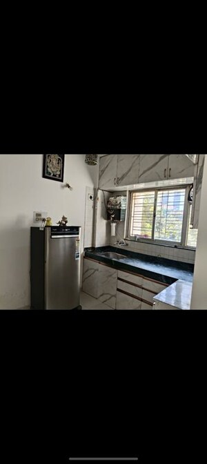 Kitchen in 1 BHK Apartment at Karan Rhea, Wadegaon – for Rent