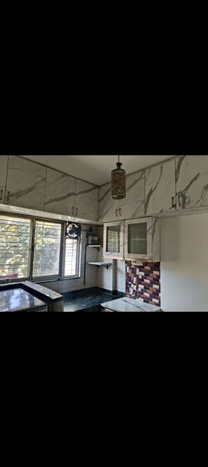 Living Room in 1 BHK Apartment at Karan Rhea, Wadegaon – for Rent