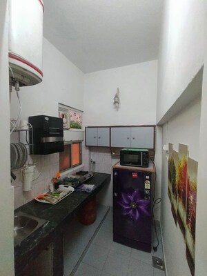 Kitchen in Studio Apartment at Defence Colony – for Rent