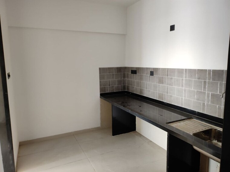 Kitchen, pristine-allure 2 Bedroom 782 Sq.Ft. Apartment In Kharadi Pune 10065465