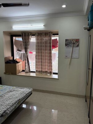 Bedroom in 2 BHK Apartment at Acme Enclave, Malad West – for Rent