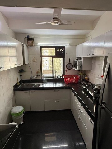 Kitchen in 2 BHK Apartment at Acme Enclave, Malad West – for Rent