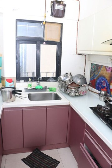 Kitchen in 1.5 BHK Apartment at Dosti Desire, Brahmand – for Sale