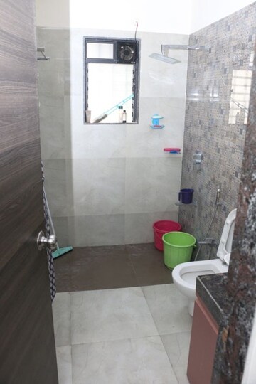 Bathroom in 1.5 BHK Apartment at Dosti Desire, Brahmand – for Sale