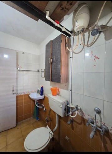 Bathroom in 2 BHK Apartment at Gulmohar Symphony, Kharadi – for Rent