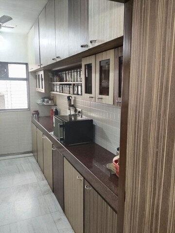 Kitchen in 3 BHK Apartment at Spark Shree Madhusudan CHS, Vile Parle East – for Sale