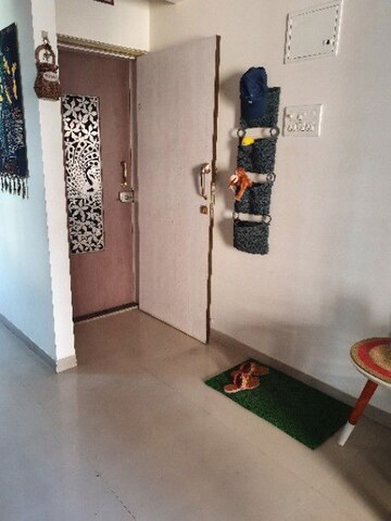 Living Room in 1 BHK Apartment at Anmol Basera, Kharghar – for Sale