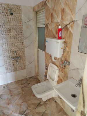 Bathroom in 1 BHK Apartment at Ram Pushpanjali Residency, Owale – for Sale