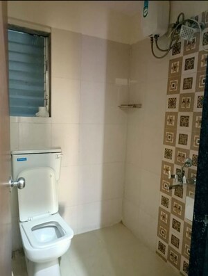 Bathroom in 2 BHK Apartment at Timmy Residency, Andheri East – for Rent