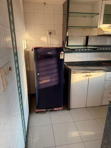 Kitchen in 2 BHK Apartment at Shivaji Park – for Sale