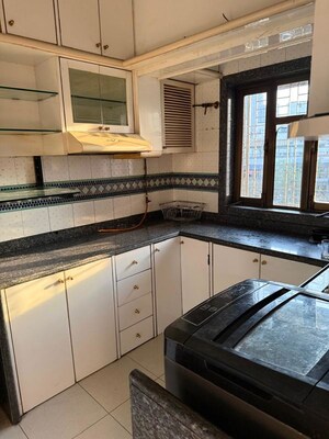 Kitchen in 2 BHK Apartment at Shivaji Park – for Sale