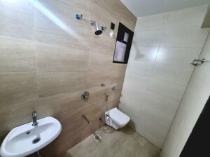 Bathroom in 2 BHK Apartment at Unique Youtopia, Kharadi – for Rent
