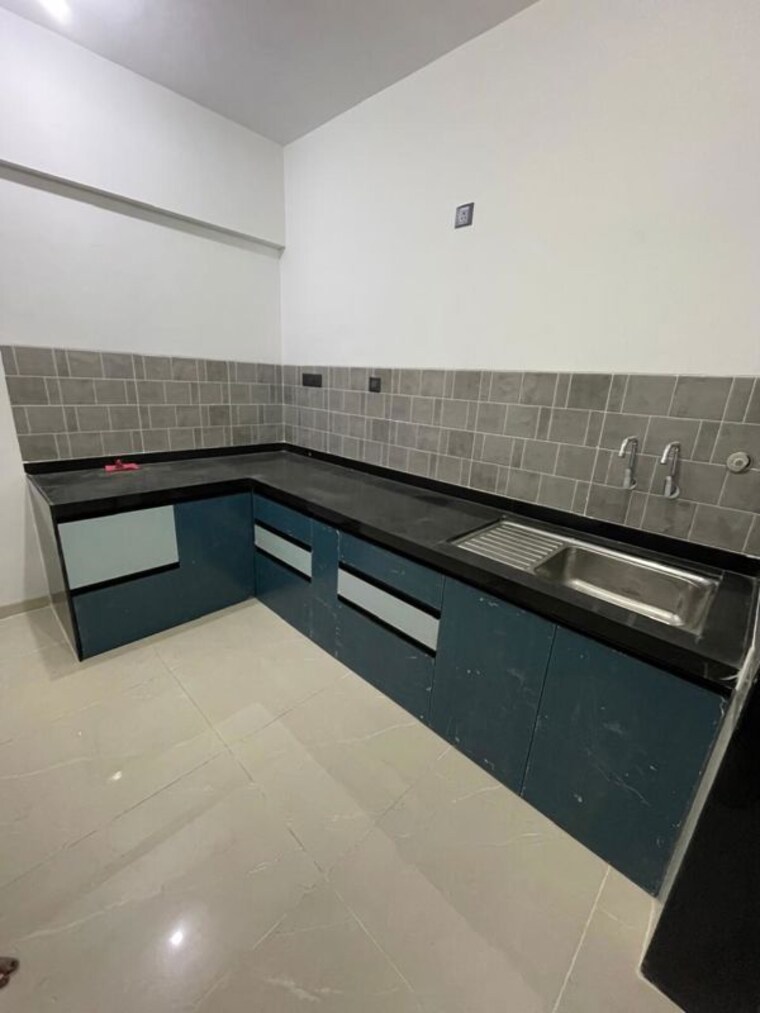 Kitchen, pristine-allure 2 Bedroom 750 Sq.Ft. Apartment In Kharadi Pune 10065830