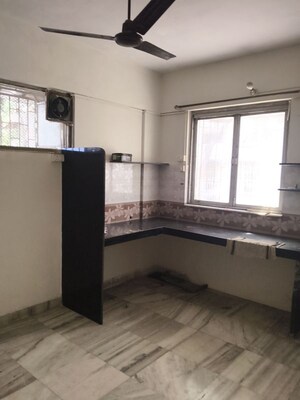 Kitchen in 1 BHK Apartment at Vile Parle West – for Rent
