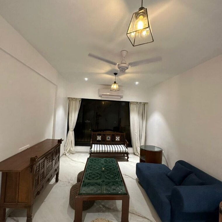 Living Room, palm-beach-apartments 1 Bedroom 600 Sq.Ft. Apartment In Versova Mumbai 10065909