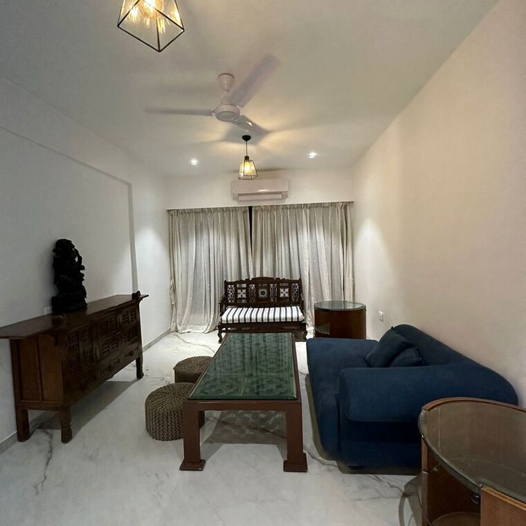 Living Room, palm-beach-apartments 1 Bedroom 600 Sq.Ft. Apartment In Versova Mumbai 10065909