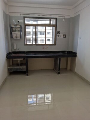 Kitchen in 2 BHK Apartment at Ganeshpeth Colony – for Rent