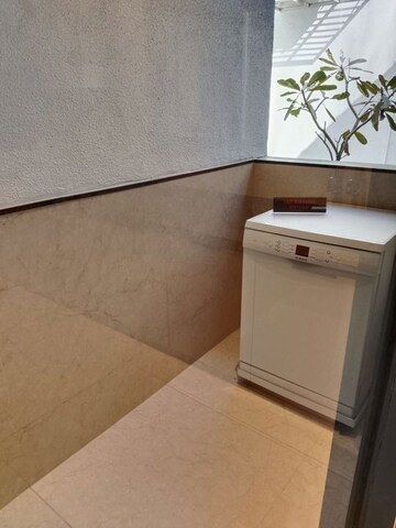 Kitchen in 3 BHK Apartment at Unique Envogue, Mundhwa – for Sale