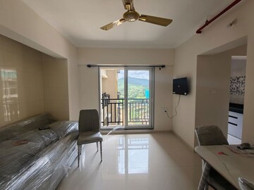 Living Room in 2 BHK Apartment at Runwal Primrose, Dombivli East – for Rent