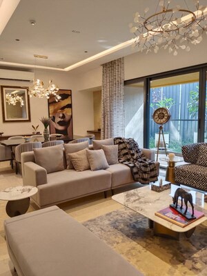 Living Room in 4 BHK Apartment at Unique Envogue, Mundhwa – for Sale