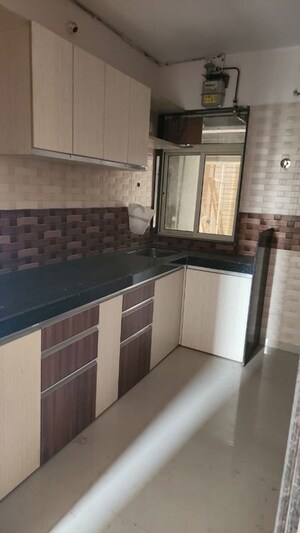 Kitchen in 2 BHK Apartment at Jangid Galaxy, Ghodbunder Road – for Sale