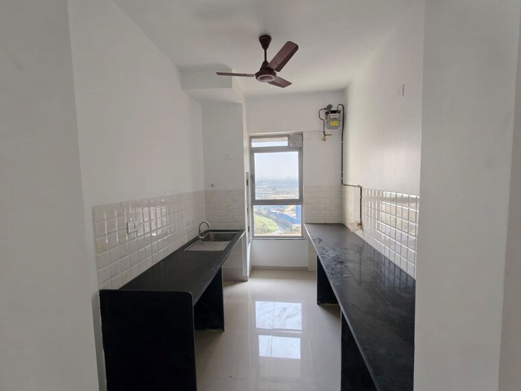 Kitchen, kalpataru-immensa 2 Bedroom 663 Sq.Ft. Apartment In Kolshet Road Thane 10066133