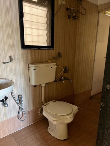Bathroom in 2 BHK Apartment at Shreeji Splendor, Brahmand – for Sale
