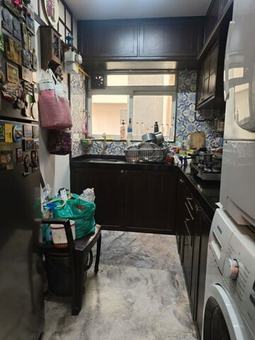 Kitchen in 2 BHK Apartment at Sugee Hiranya, Dadar West – for Sale