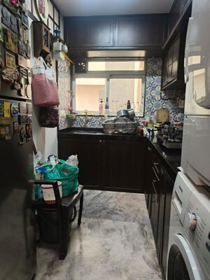 Kitchen in 2 BHK Apartment at Sugee Hiranya, Dadar West – for Sale