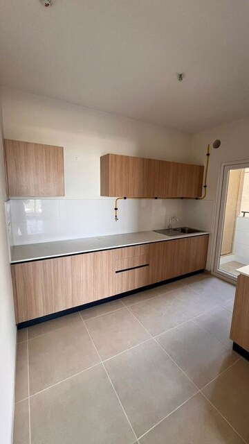 Kitchen in 3 BHK Apartment at Bhartiya City Nikoo Homes 4, Thanisandra Main Road – for Rent