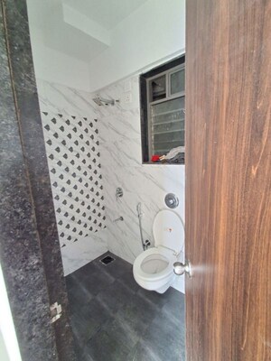 Bathroom in 1 BHK Apartment at UK Iridium Tower 2, Kandivali East – for Rent