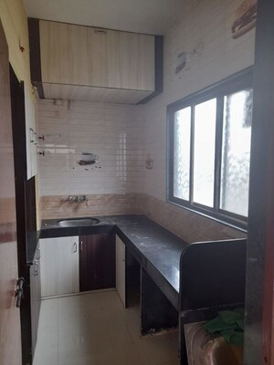 Kitchen in 2 BHK Apartment at  Ganesh Corner Apartment, Dapodi – for Rent