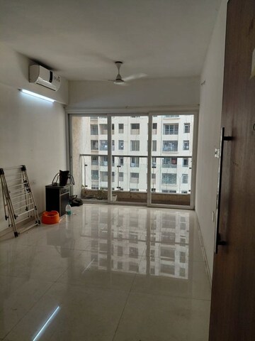 Living Room in 2 BHK Apartment at Rustomjee Urbania Azziano, Thane West – for Sale