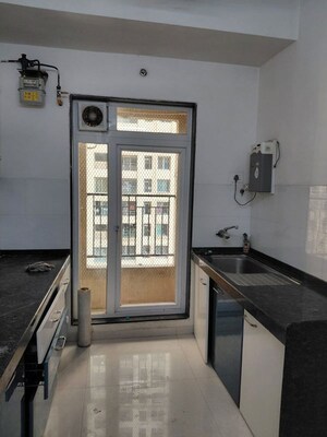 Living Room in 2 BHK Apartment at Rustomjee Urbania Azziano, Thane West – for Sale