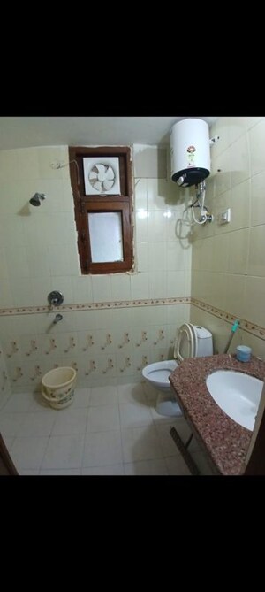 Bathroom in 1 BHK Apartment at NK Sharma Savitry Greens 2, Ghazipur – for Rent