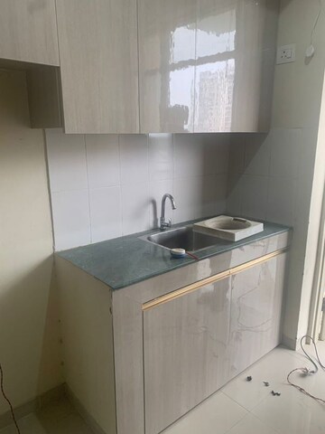 Kitchen in 2 BHK Apartment at Adani Aangan Arcade, Sector 88a – for Rent