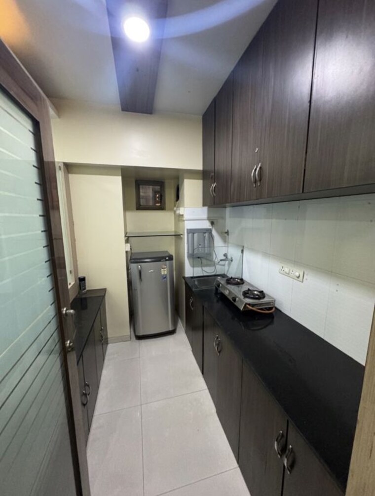 Kitchen, hermes-heritage-homes 1 Bedroom 650 Sq.Ft. Apartment In Shastrinagar Pune 10066877